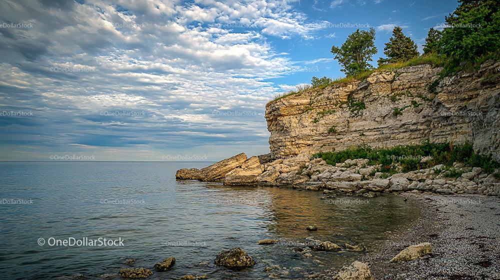 Rocky Cliffs Overlooking a Peaceful Ocean Scene