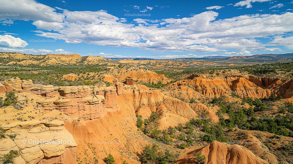 Dramatic Orange Cliffs Under a Vast Blue Sky