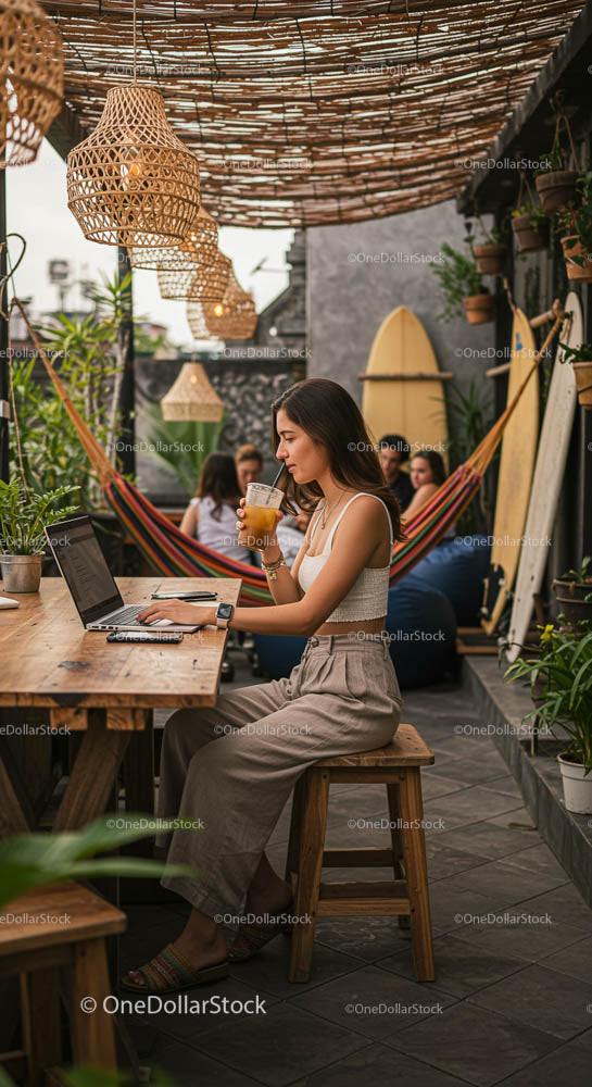 Woman Enjoying Work and Coffee in a Stylish Patio Setting