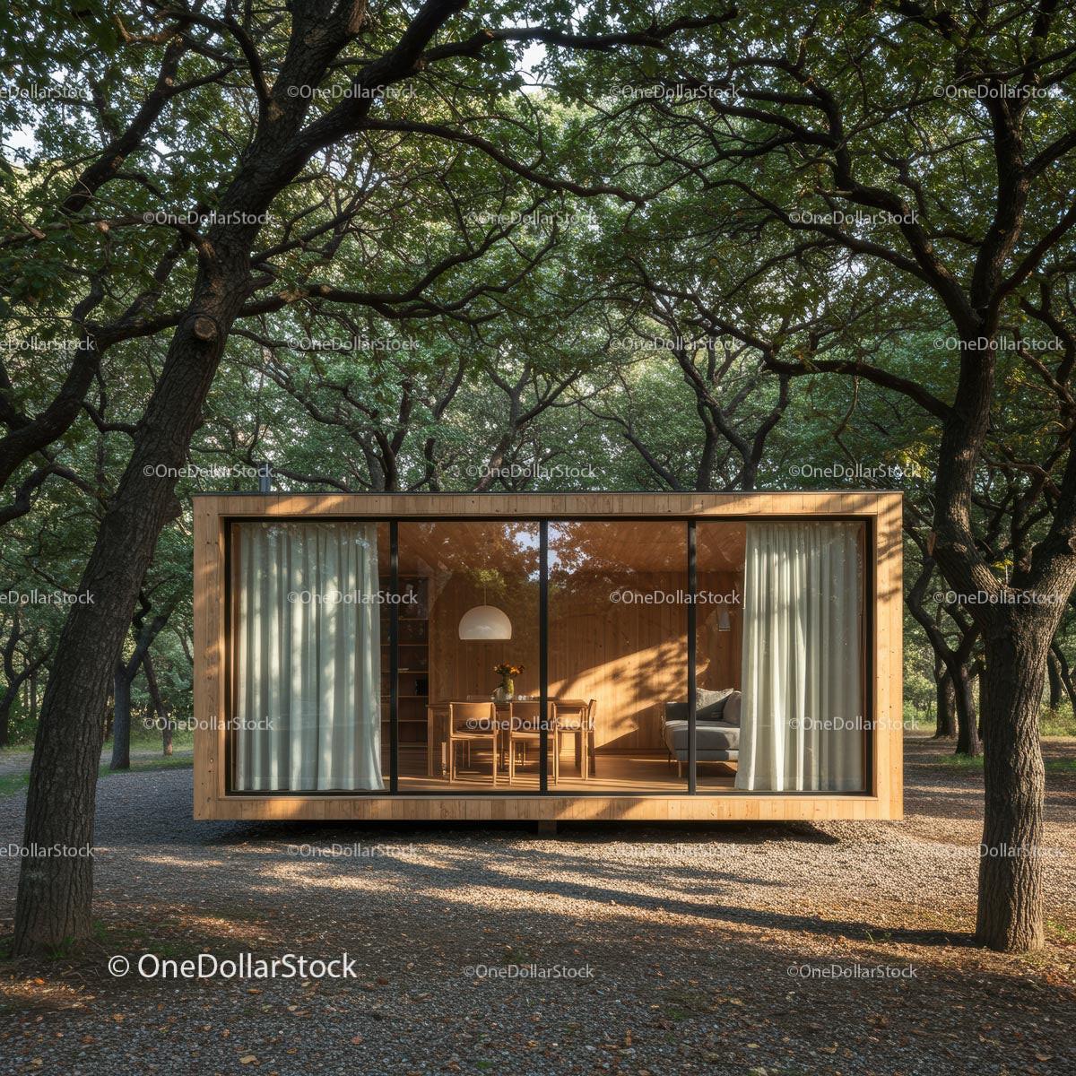 Modern Glass-Walled Cabin in Serene Forest Setting
