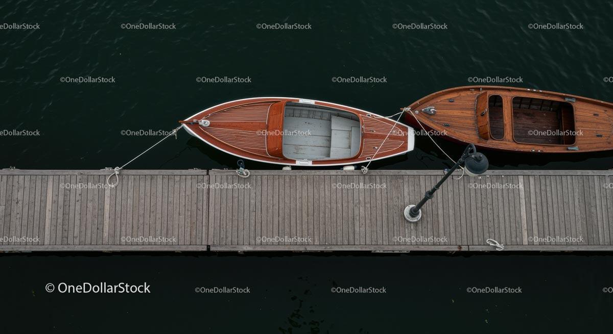 Aerial View of Wooden Boats Moored at a Tranquil Dock