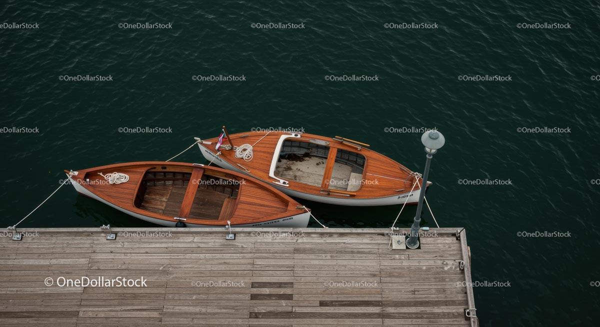 Vintage Wooden Boats Moored at a Scenic Dock