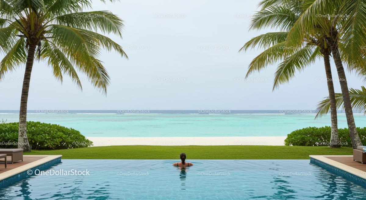 Relaxing in Infinity Pool with Ocean View and Palms