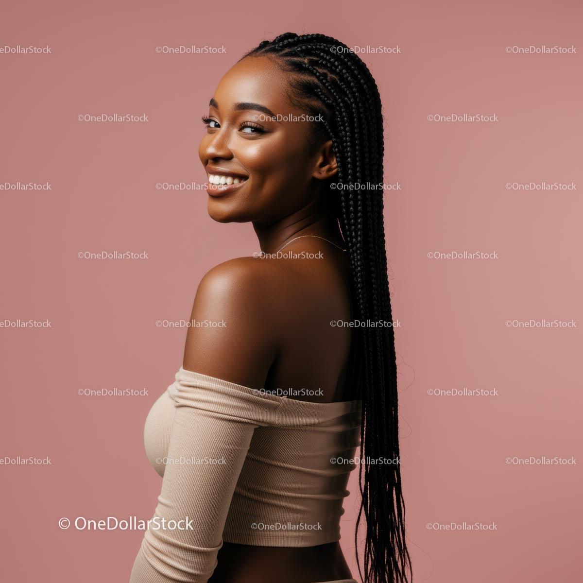 Smiling Woman with Braided Hair in Beige Top on Pink Background