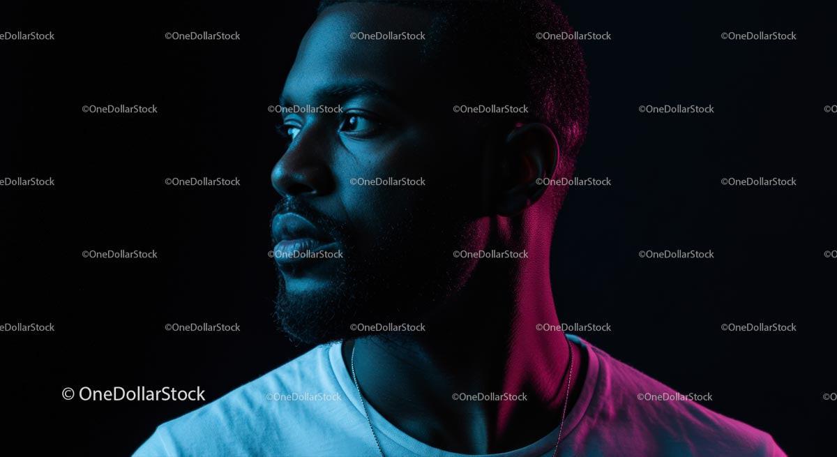 Side Profile Portrait in Blue and Pink Dramatic Lighting