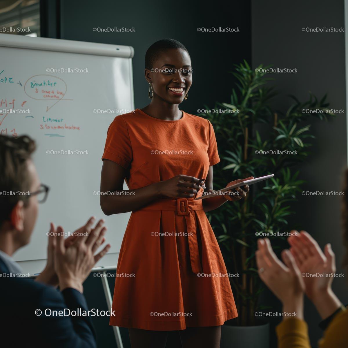 Confident Woman Presenting in Orange Dress at Business Meeting