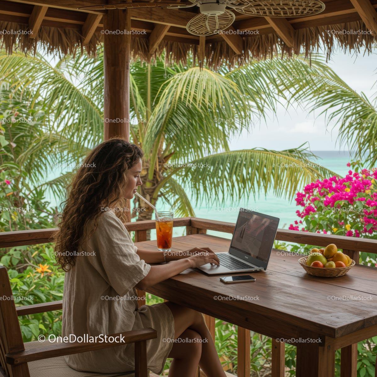 Woman Working on Laptop in Tropical Beachfront Setting