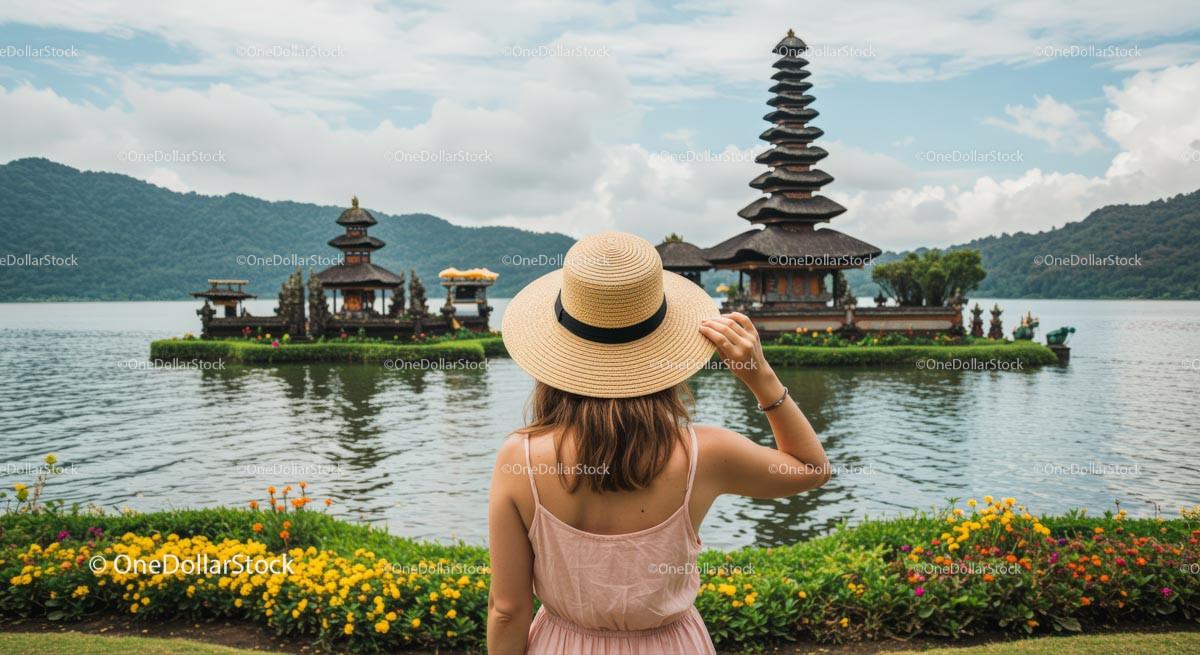 Woman in Hat Admiring Ulun Danu Bratan Temple in Bali Stock Photo Bundle preview 6