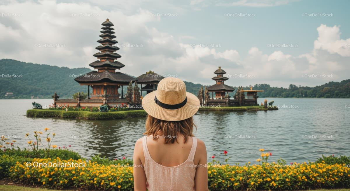 Woman in Hat Admiring Ulun Danu Bratan Temple in Bali Stock Photo Bundle preview 8