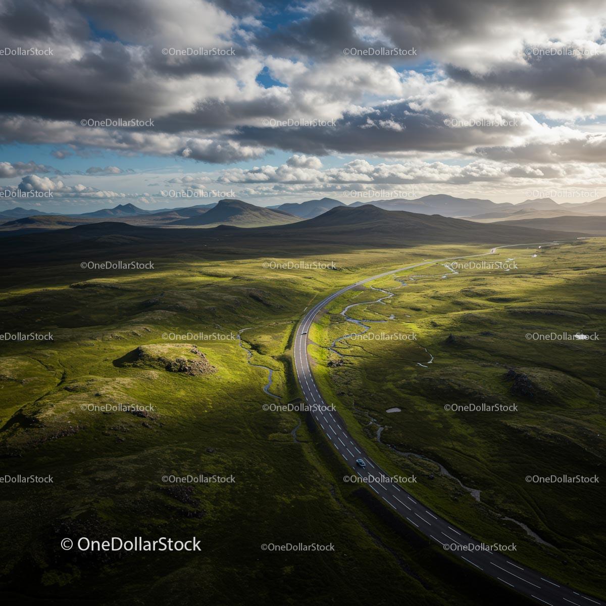 Scenic Winding Road Through Lush Green Mountains