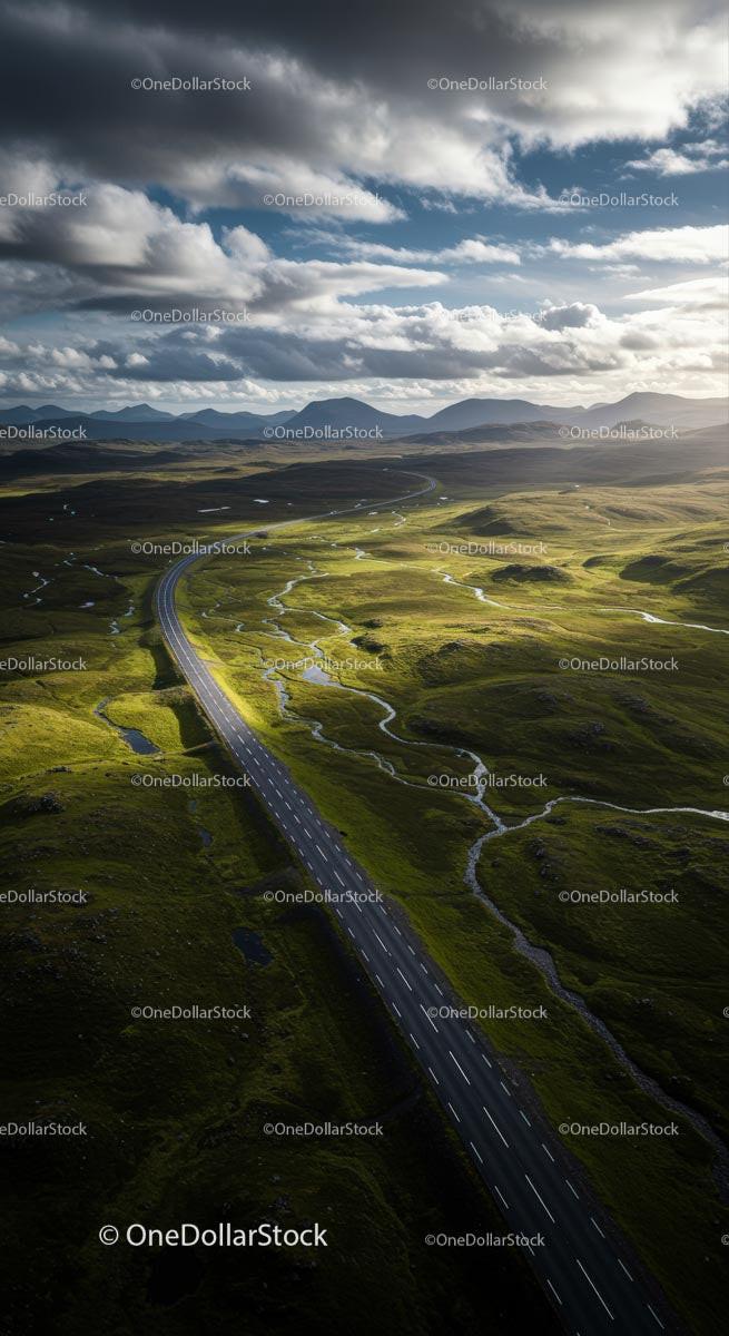 Scenic Highway Surrounded by Rolling Green Hills