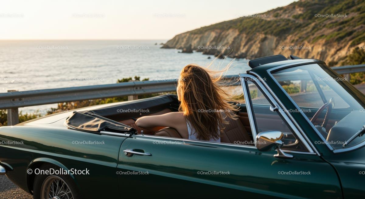 Woman Enjoying Scenic Coastal Drive in Convertible Car