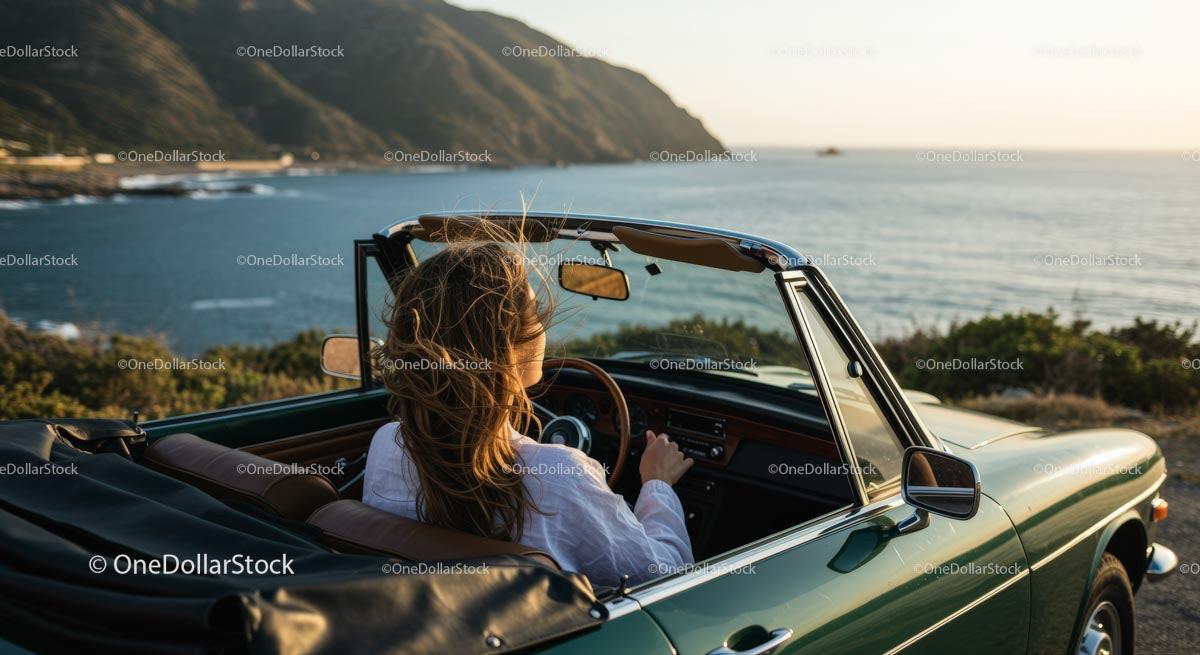 Woman Enjoying a Scenic Coastal Drive in a Convertible