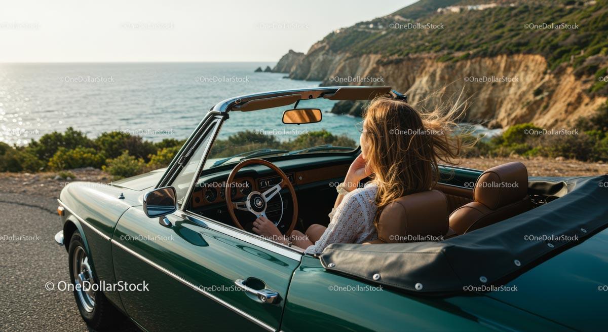 Woman Driving Vintage Convertible on Scenic Coastal Road