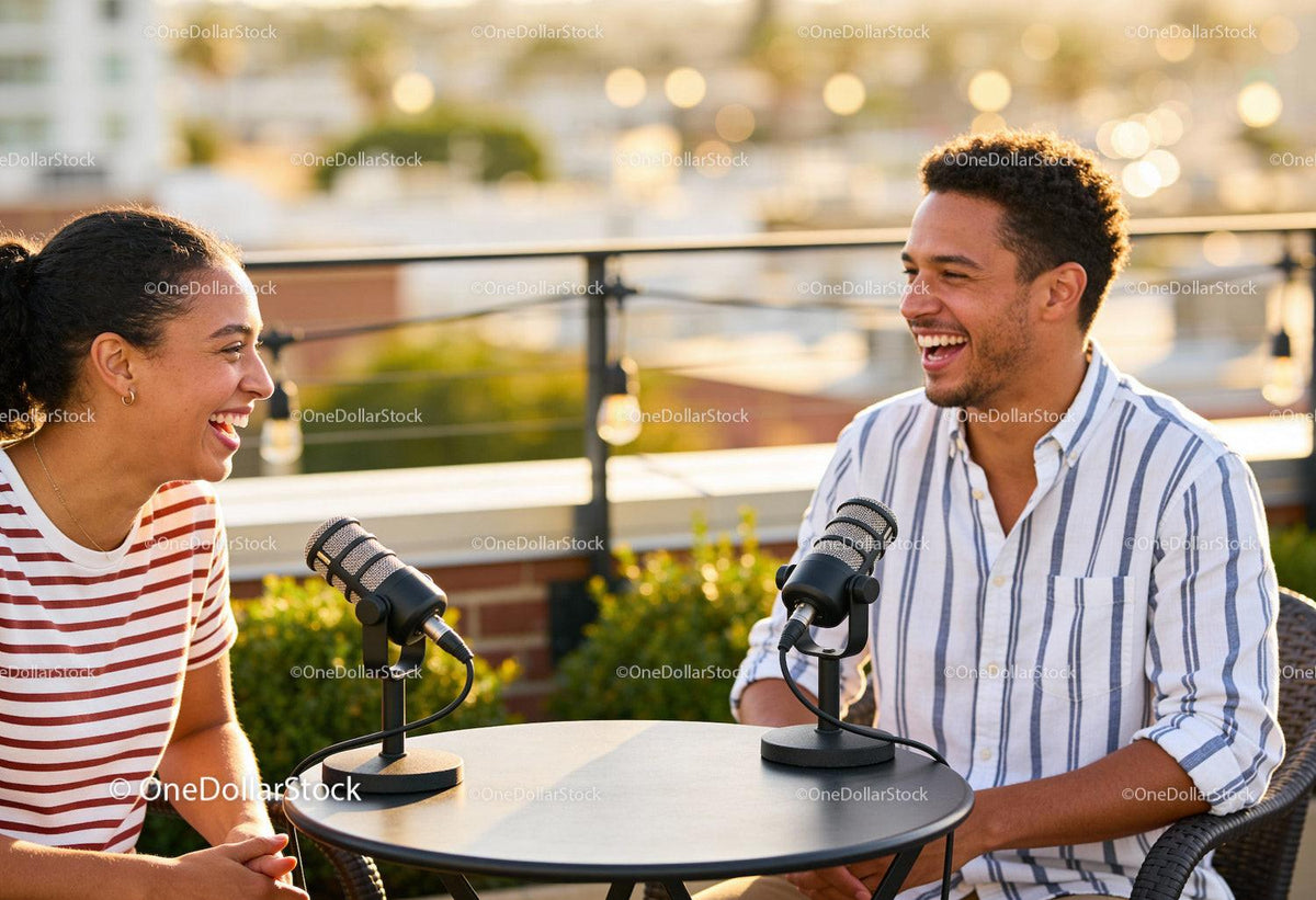 Young friends laughing during outdoor rooftop podcast