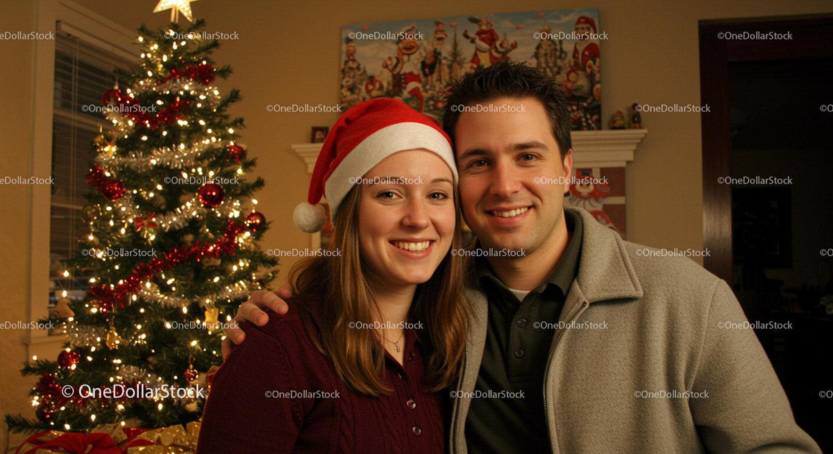Couple Smiling Together by Festive Christmas Tree