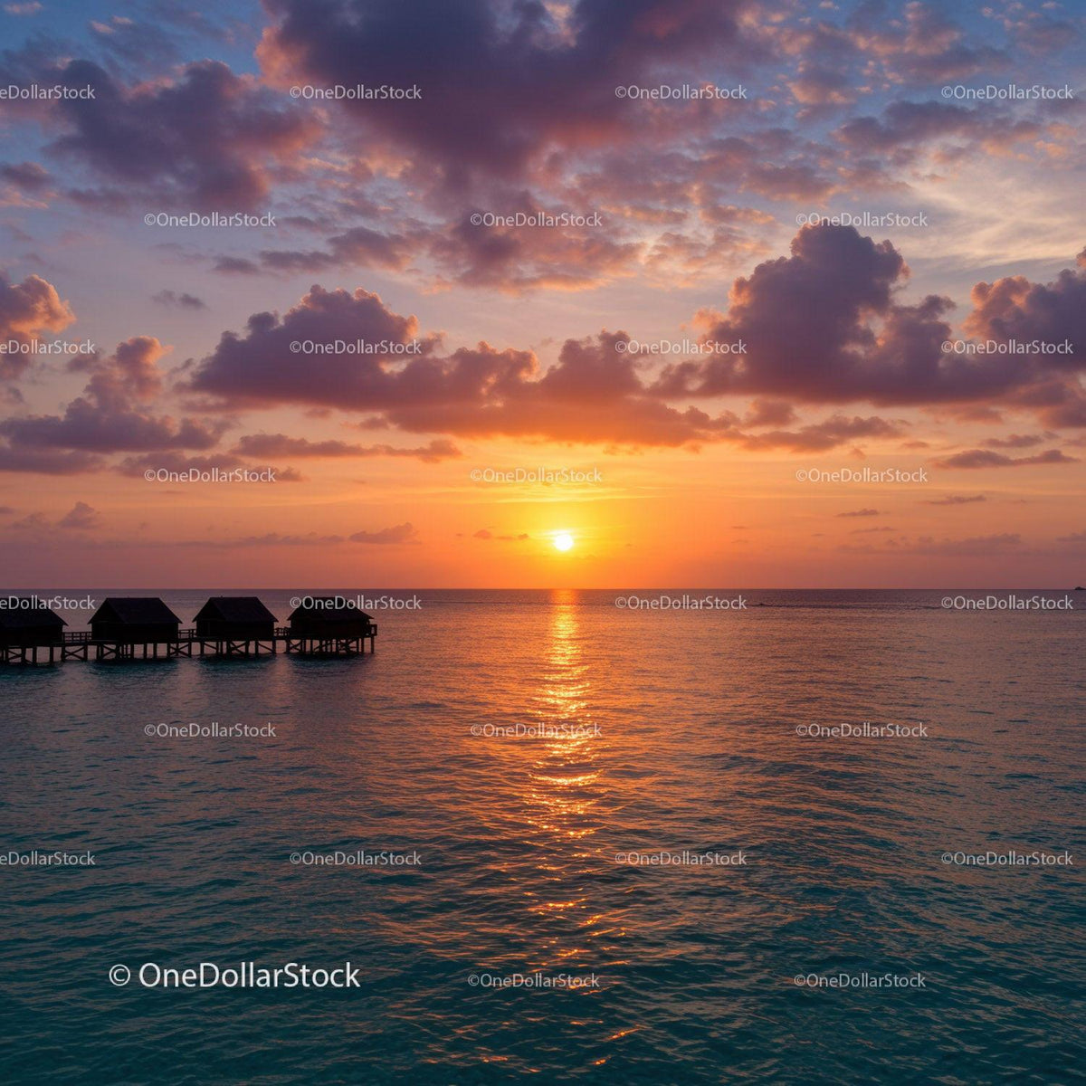 Beautiful Sunset Over Calm Ocean with Vibrant Sky and Clouds
