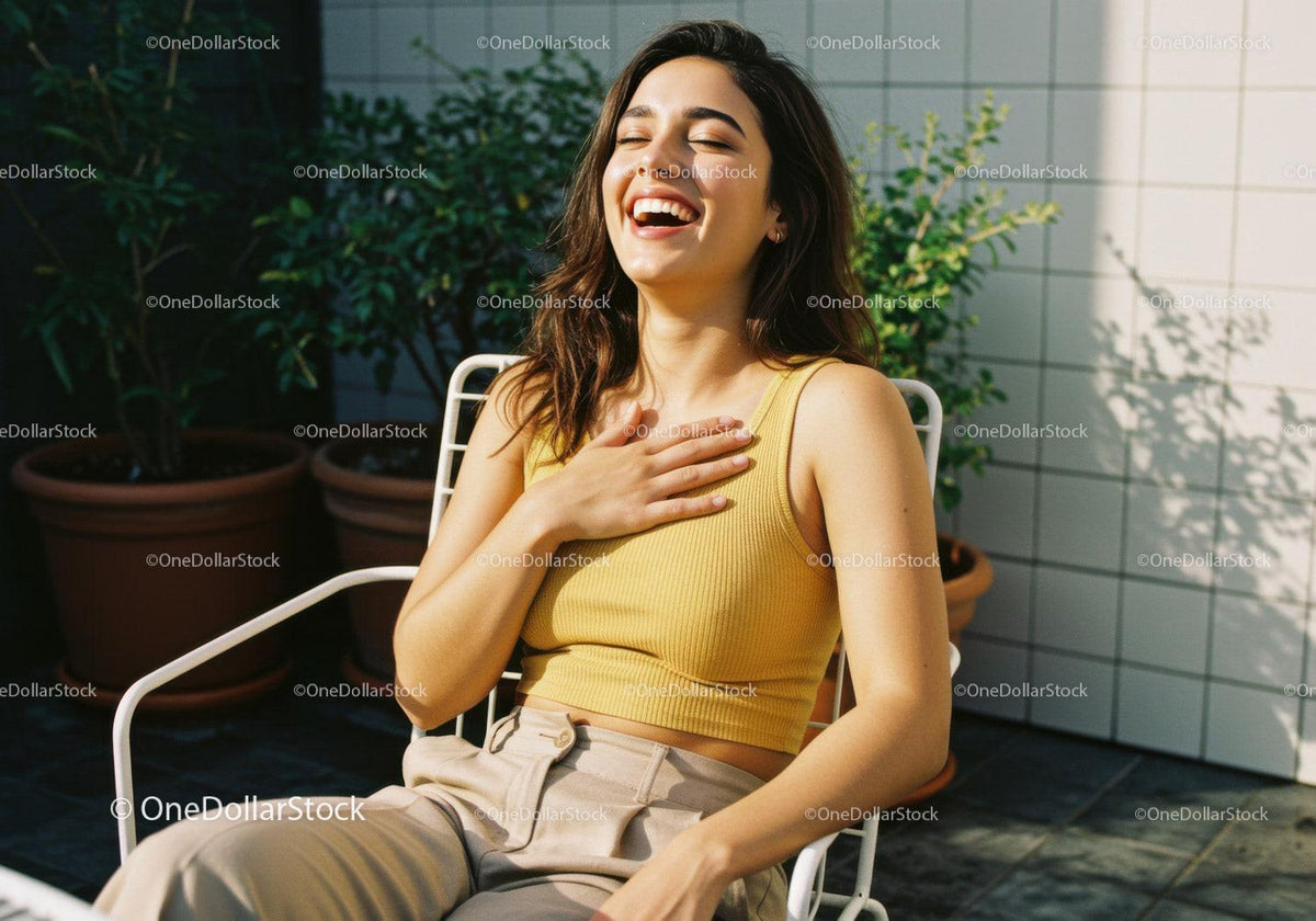 Young Woman Laughing Relaxing Outdoors in Sunny Garden