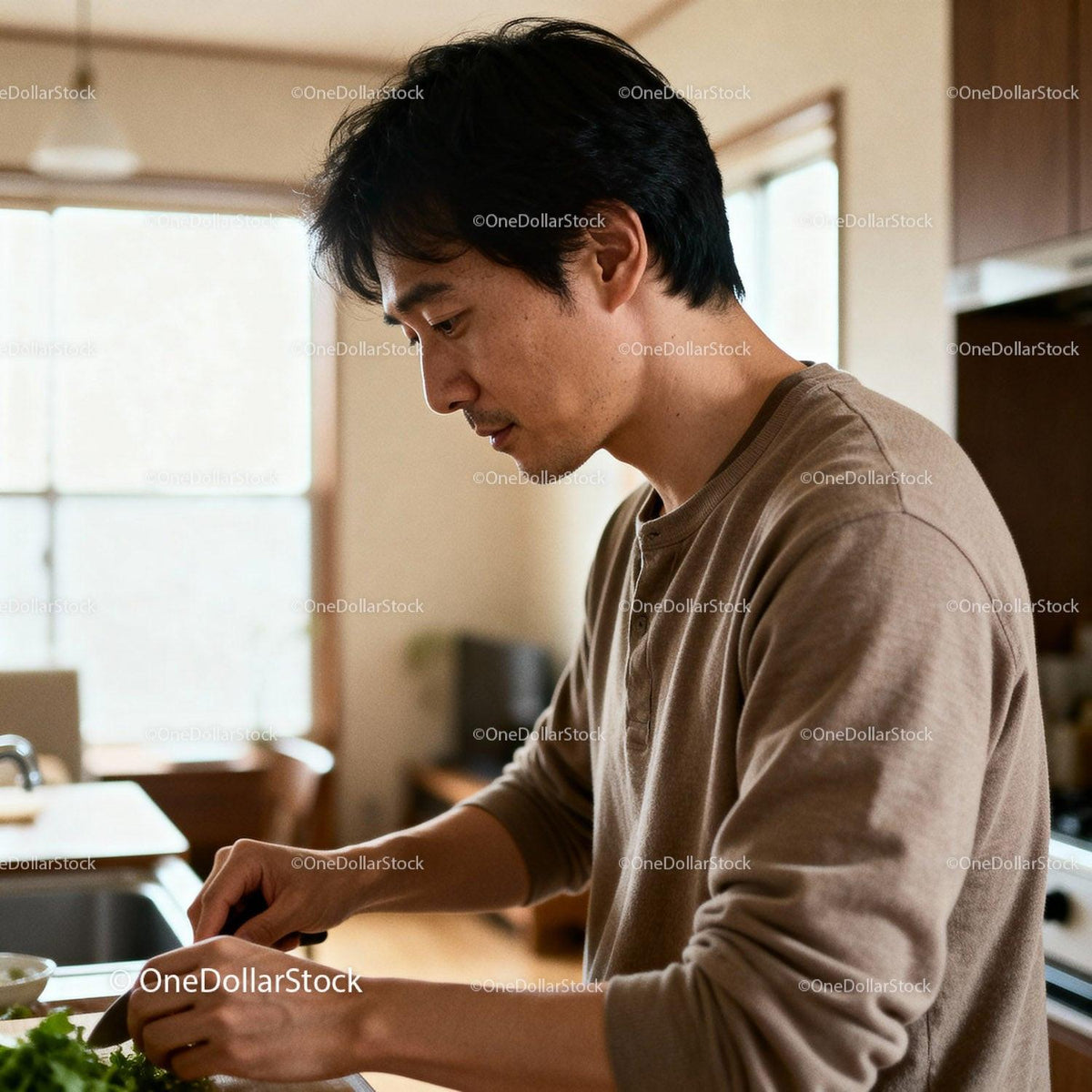Man focused on preparing fresh salad in home kitchen