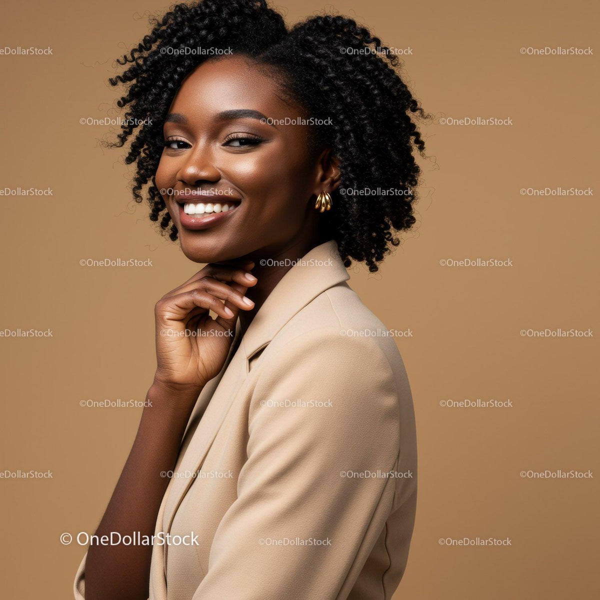 Elegant Black Woman with Curly Hair Wearing Beige Blazer and Gold Earrings