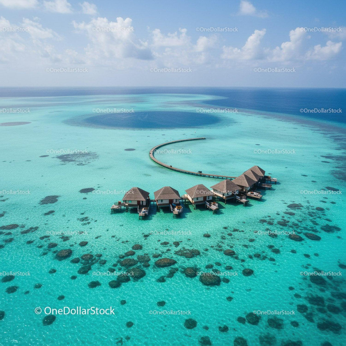 Overwater Bungalows in Crystal Clear Turquoise Lagoon with Wooden Pier