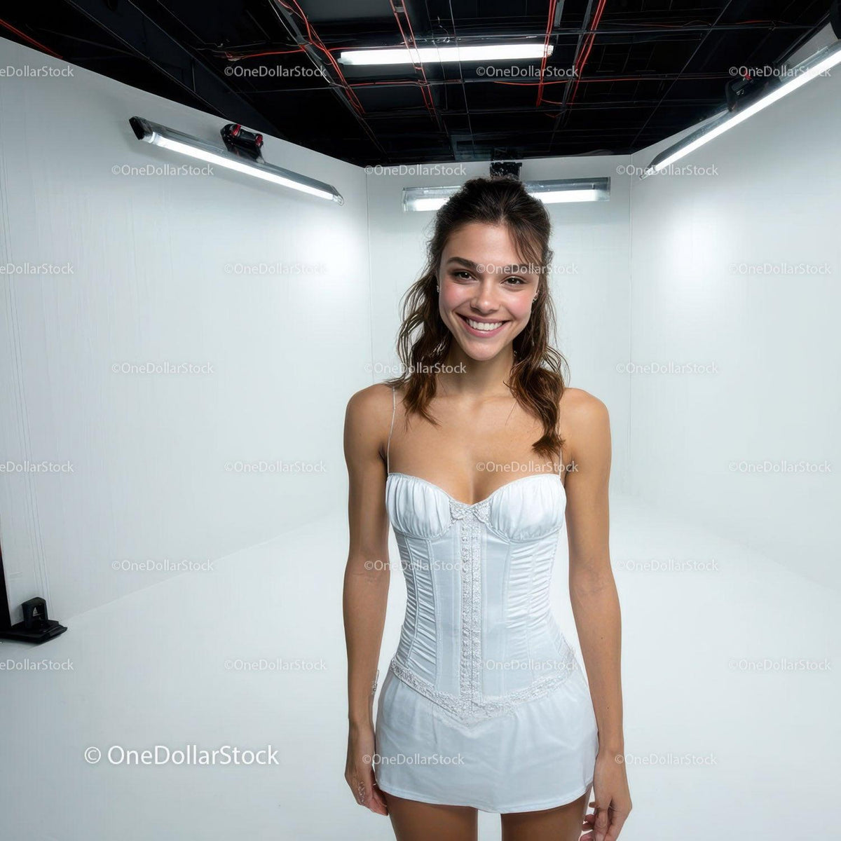 Young Woman in White Dress Standing in Photography Studio