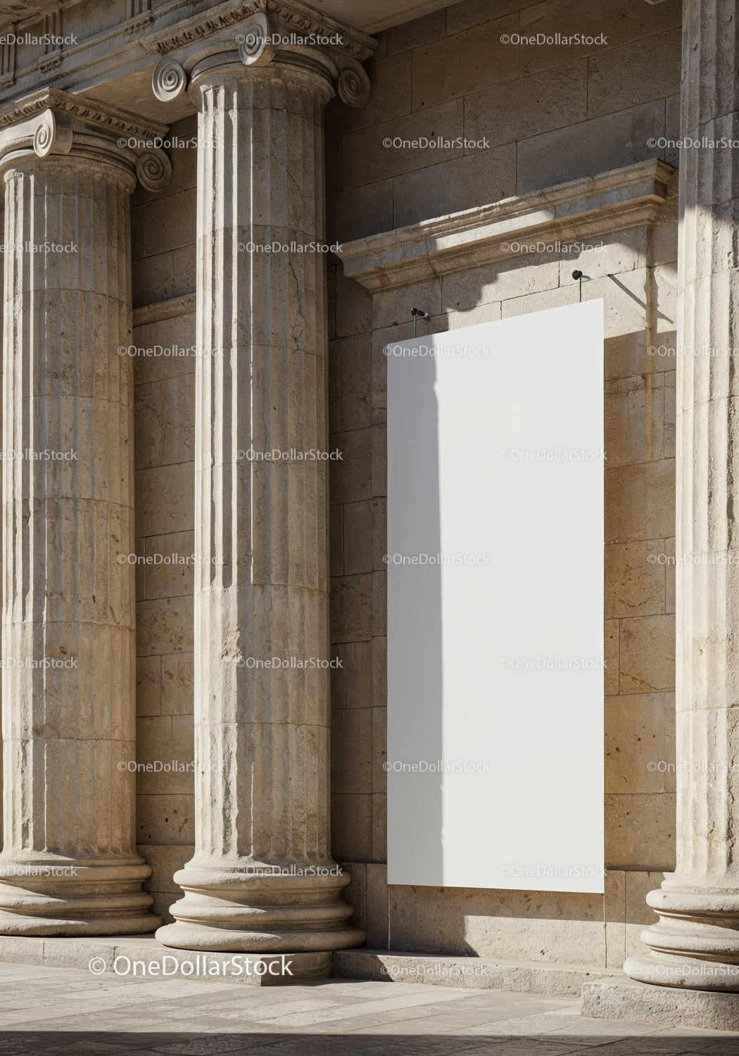 Blank vertical signboard on classical stone columns facade