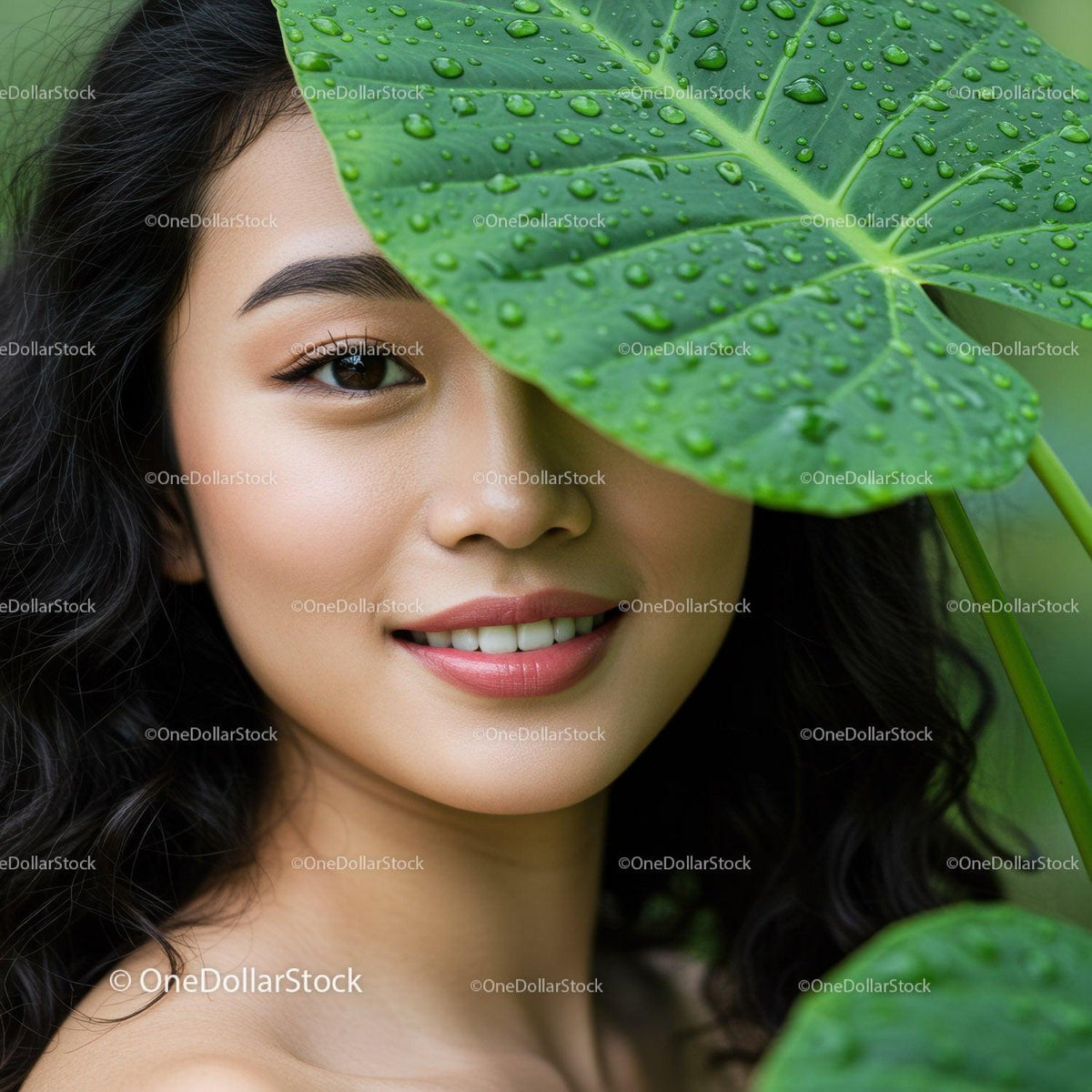Portrait of a Smiling Woman with a Large Green Leaf Covering One Eye