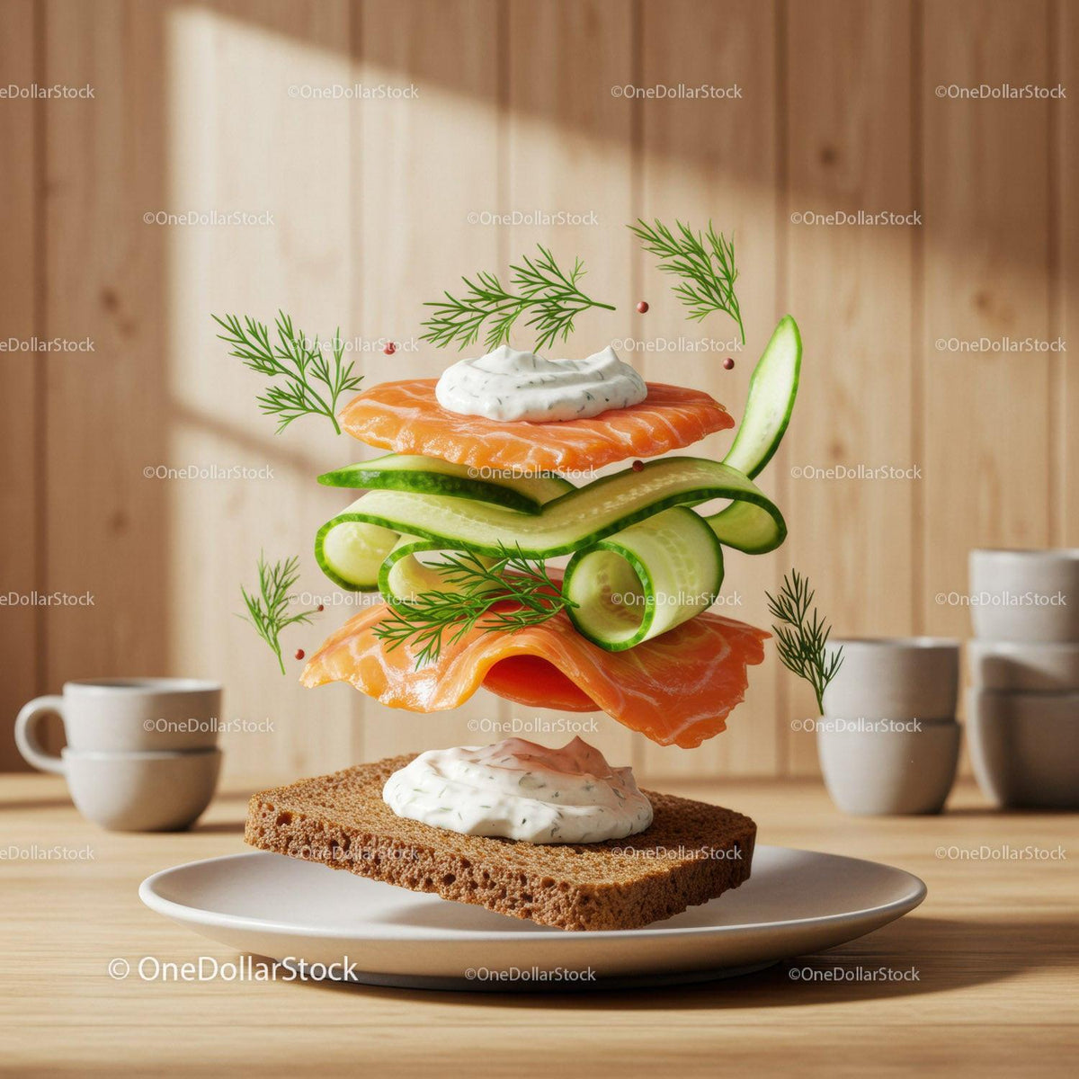 Fresh salmon sandwich ingredients floating on rye bread