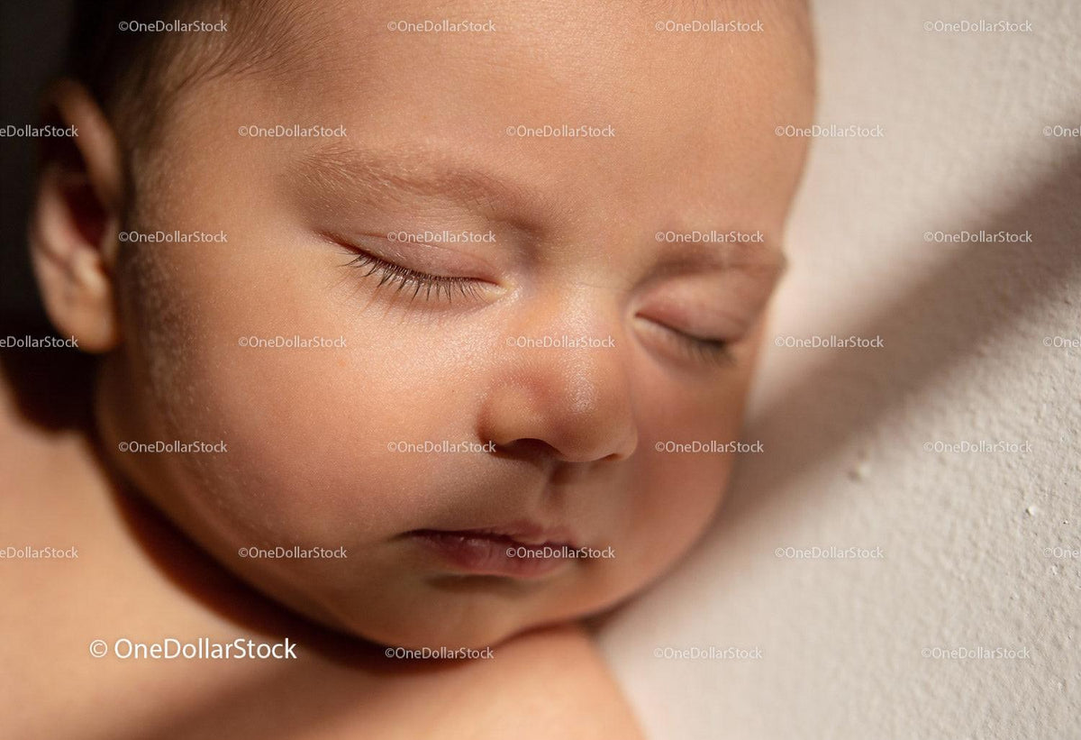 Peaceful sleeping baby in soft natural light