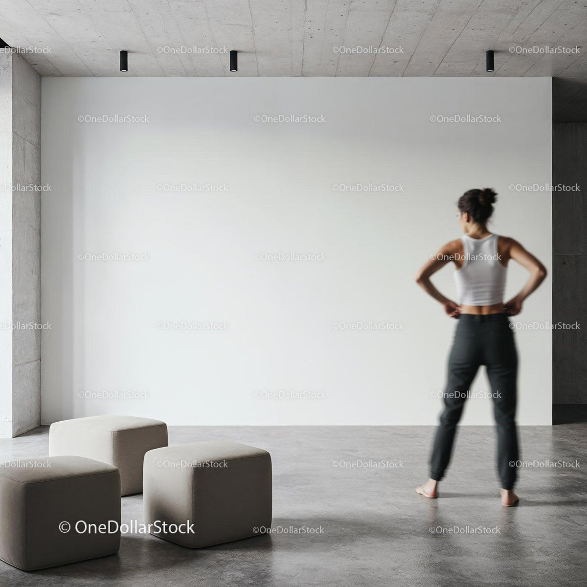 Woman contemplating blank wall in modern minimalist room JPG Mockup Image preview