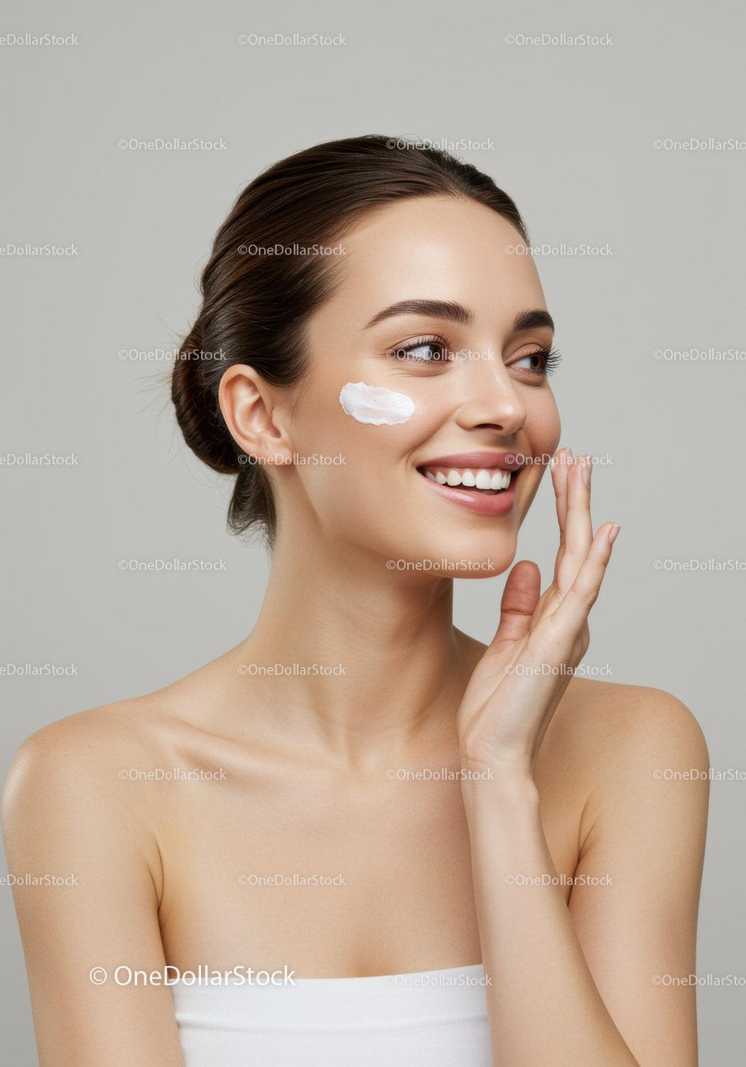 Young Woman Applying Skincare Cream for Healthy Radiant Skin