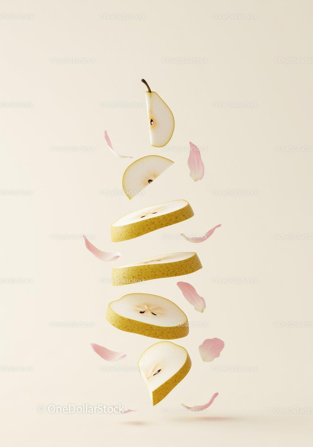 Floating Sliced Pear with Delicate Pink Petals