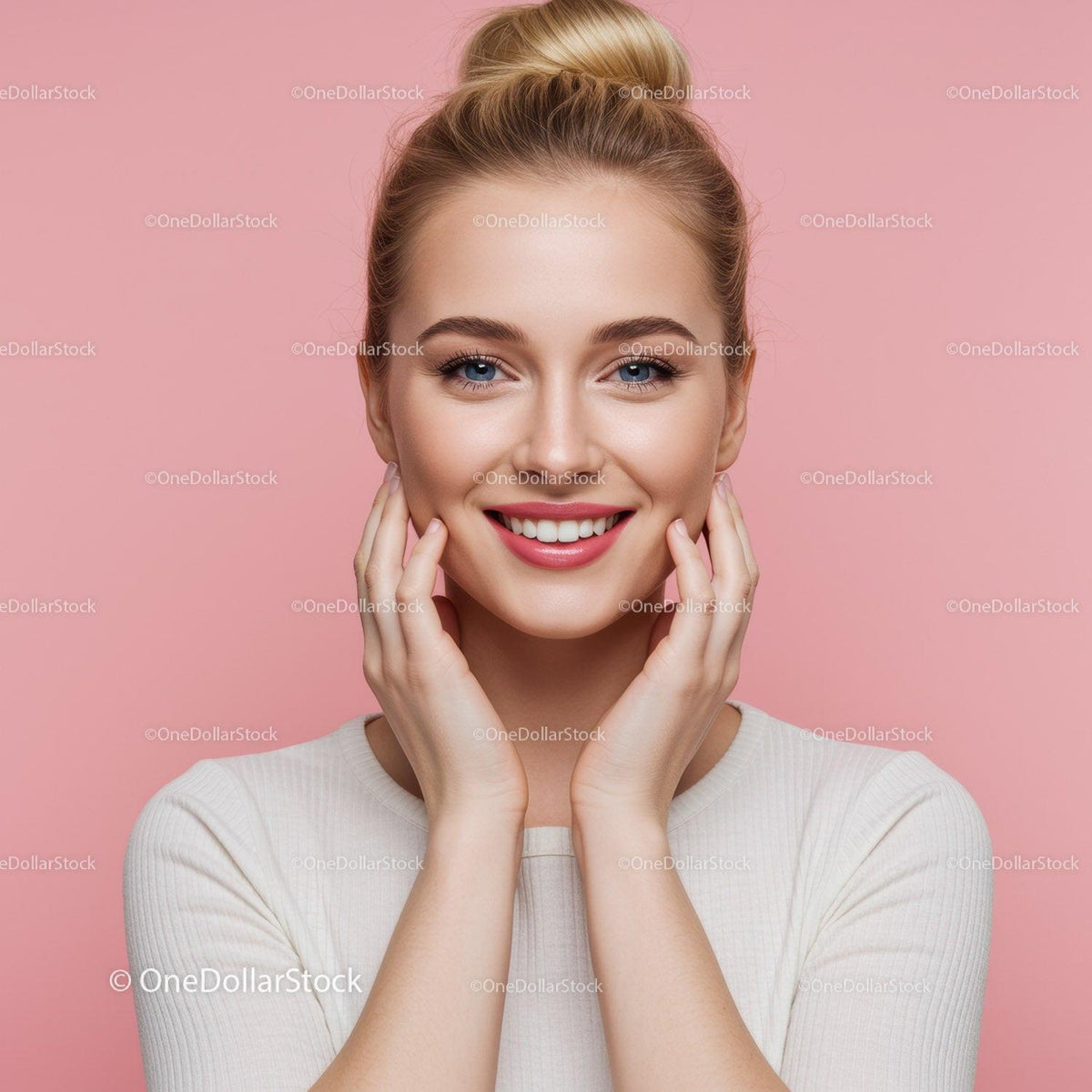 Smiling Blonde Woman with Blue Eyes and Clear Skin on Pink Background