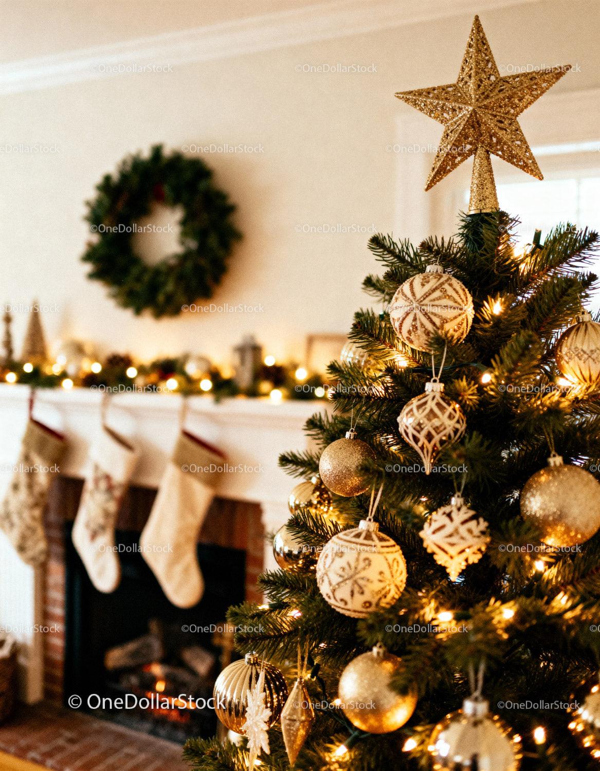 Cozy Christmas tree with golden ornaments by fireplace