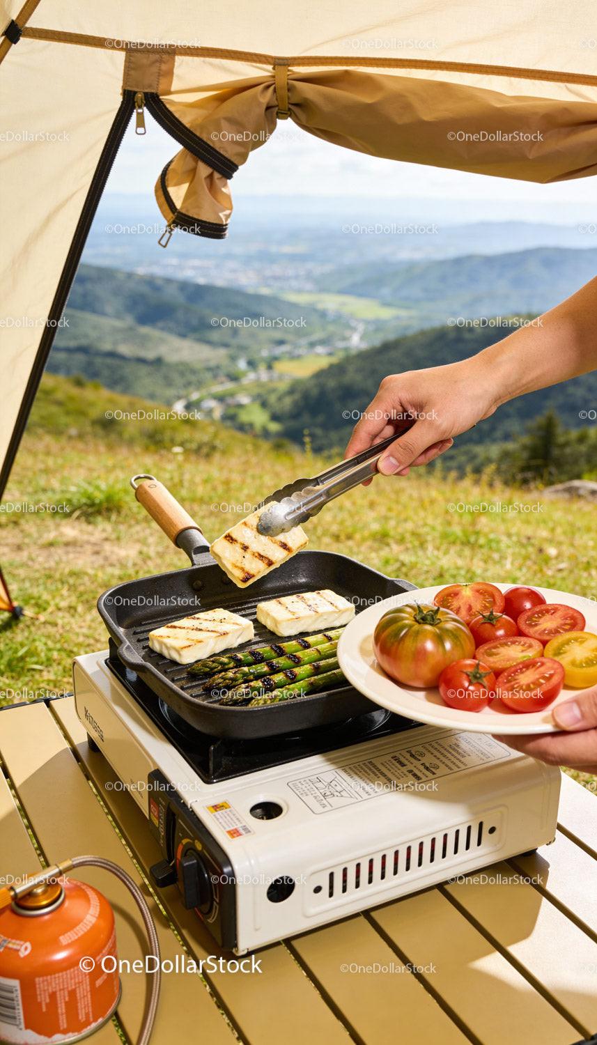 Grilling Halloumi and Asparagus Outdoors with Scenic View