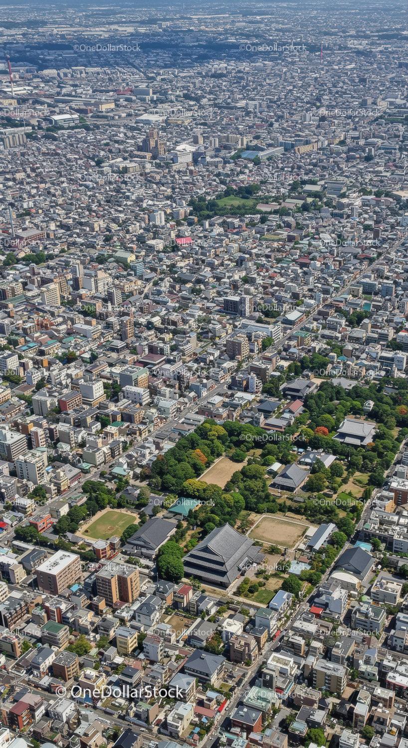Aerial View of Tokyo Cityscape with Skyscrapers and Green Parks