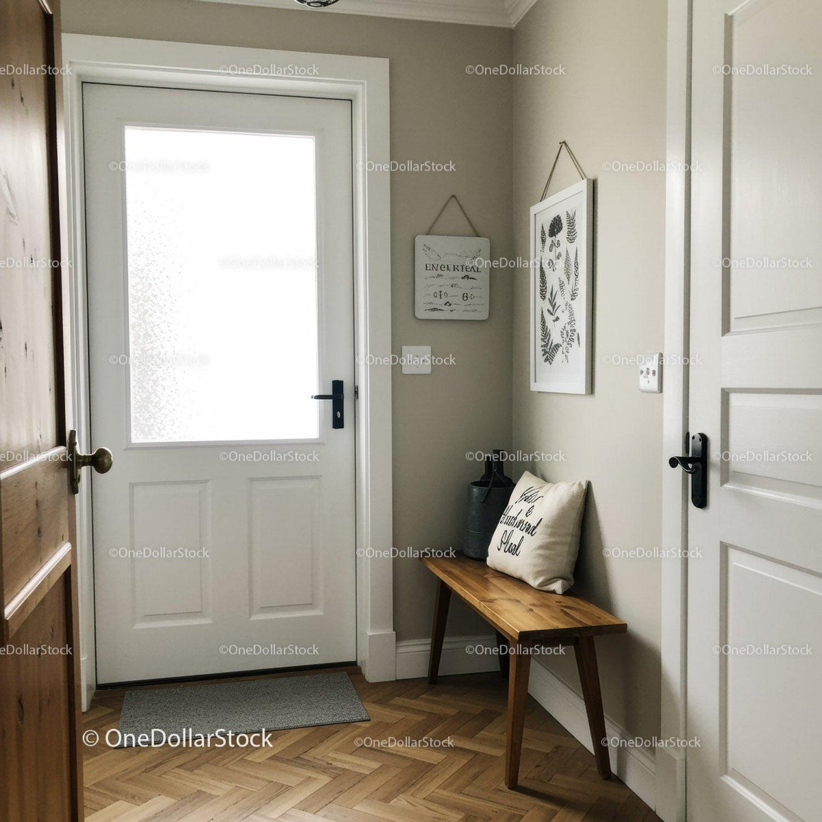 Calm Modern Entryway with Wooden Bench and Wall Art in Neutral Tones