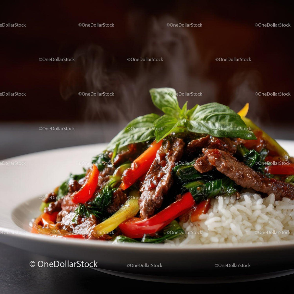 Beef Stir-Fry with Bell Peppers and Fresh Basil Served with Rice