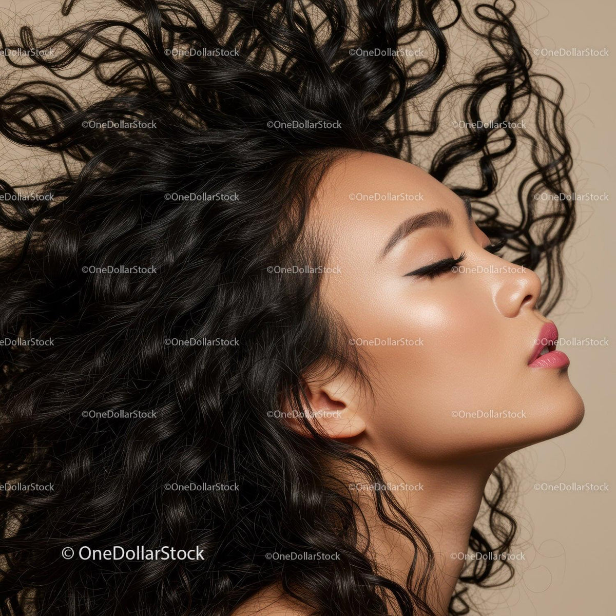 Profile of woman with flowing curly black hair