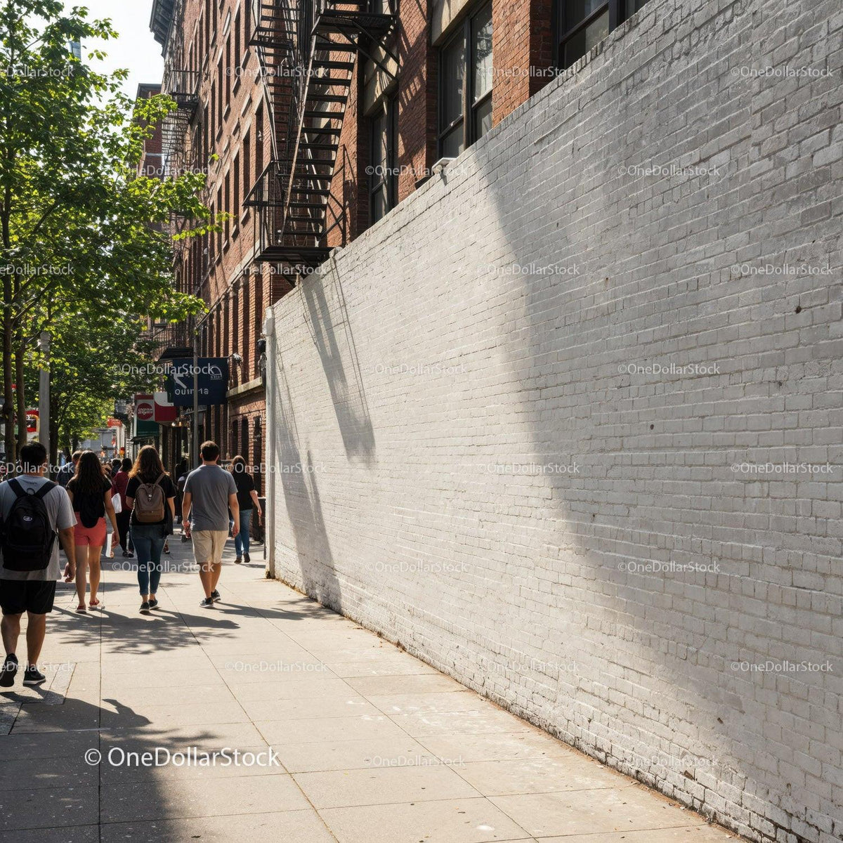 City sidewalk with white brick wall and pedestrians during sunny day JPG Mockup Image preview