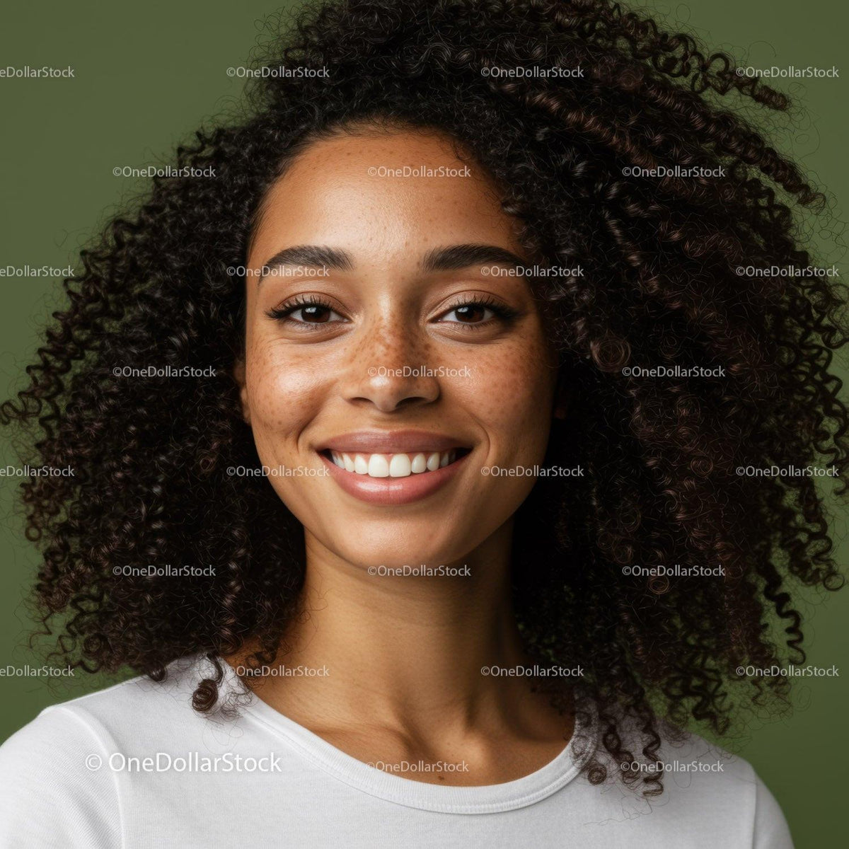 Smiling Woman with Curly Hair and Freckles in Bright Portrait