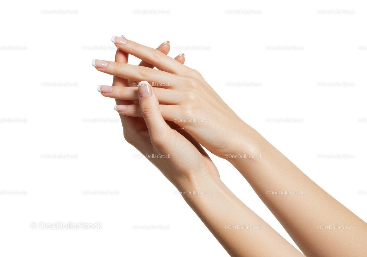 Close up of well-groomed hands with french manicure