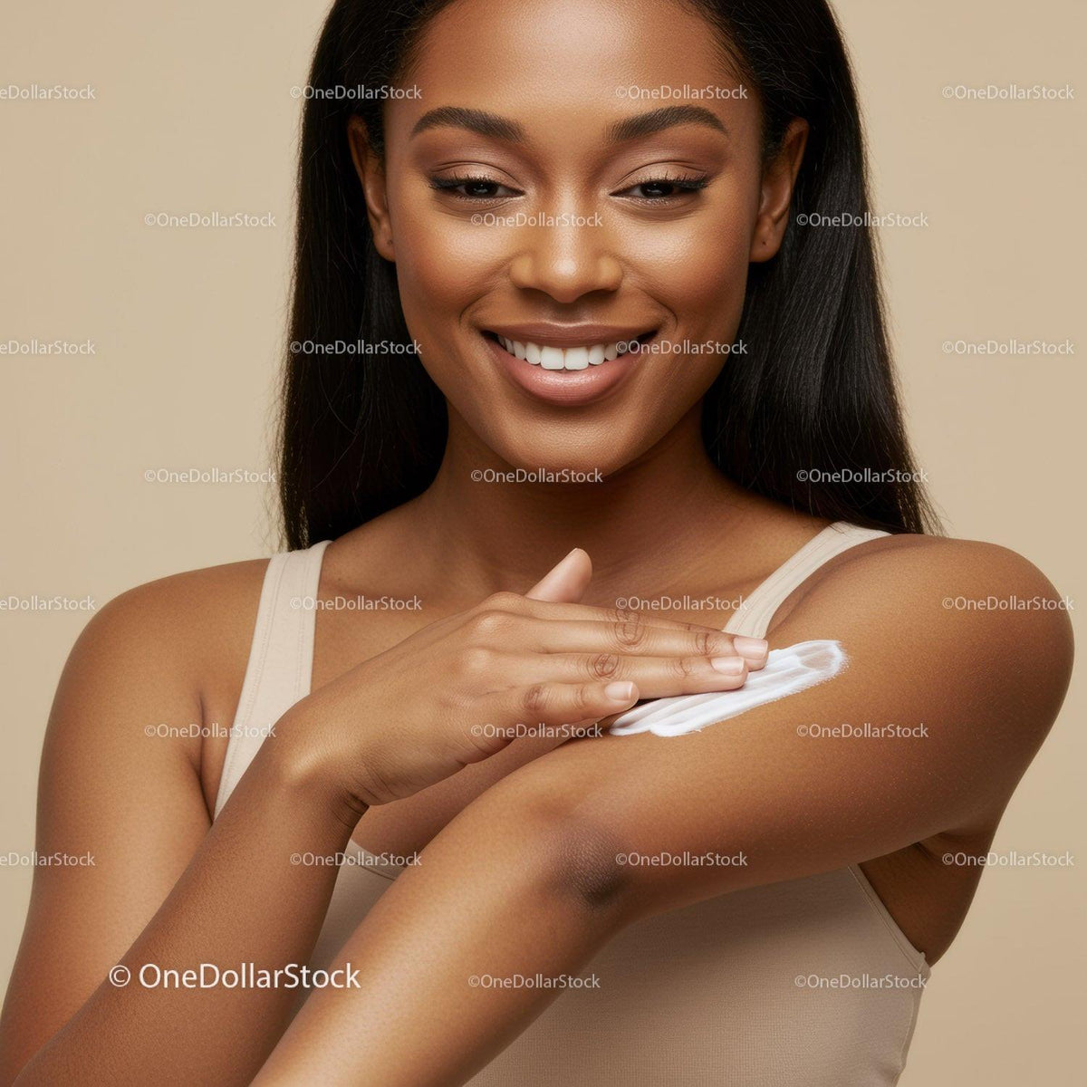 Beautiful Woman Applying Lotion to Arm for Radiant Skin