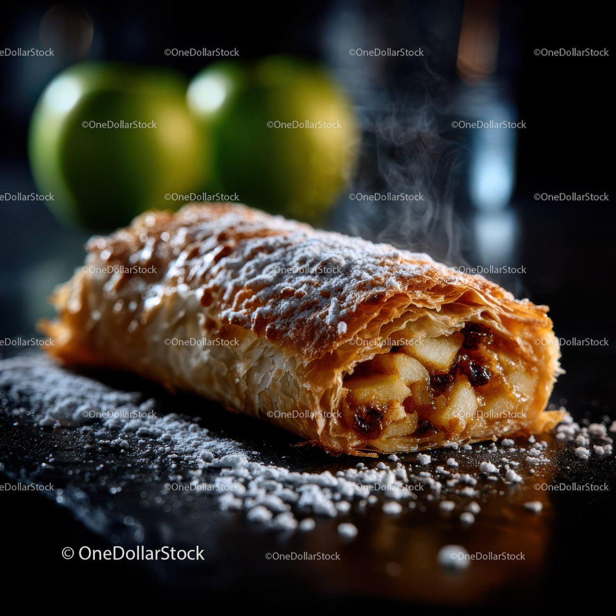 Apple Strudel Pastry with Powdered Sugar on Dark Surface