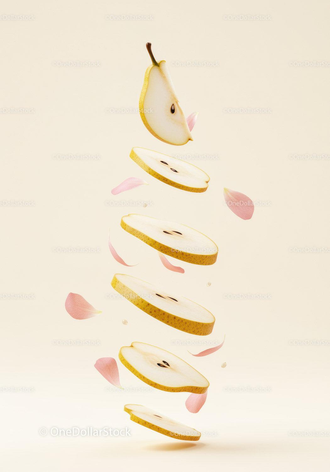 Floating Sliced Pear with Delicate Pink Petals