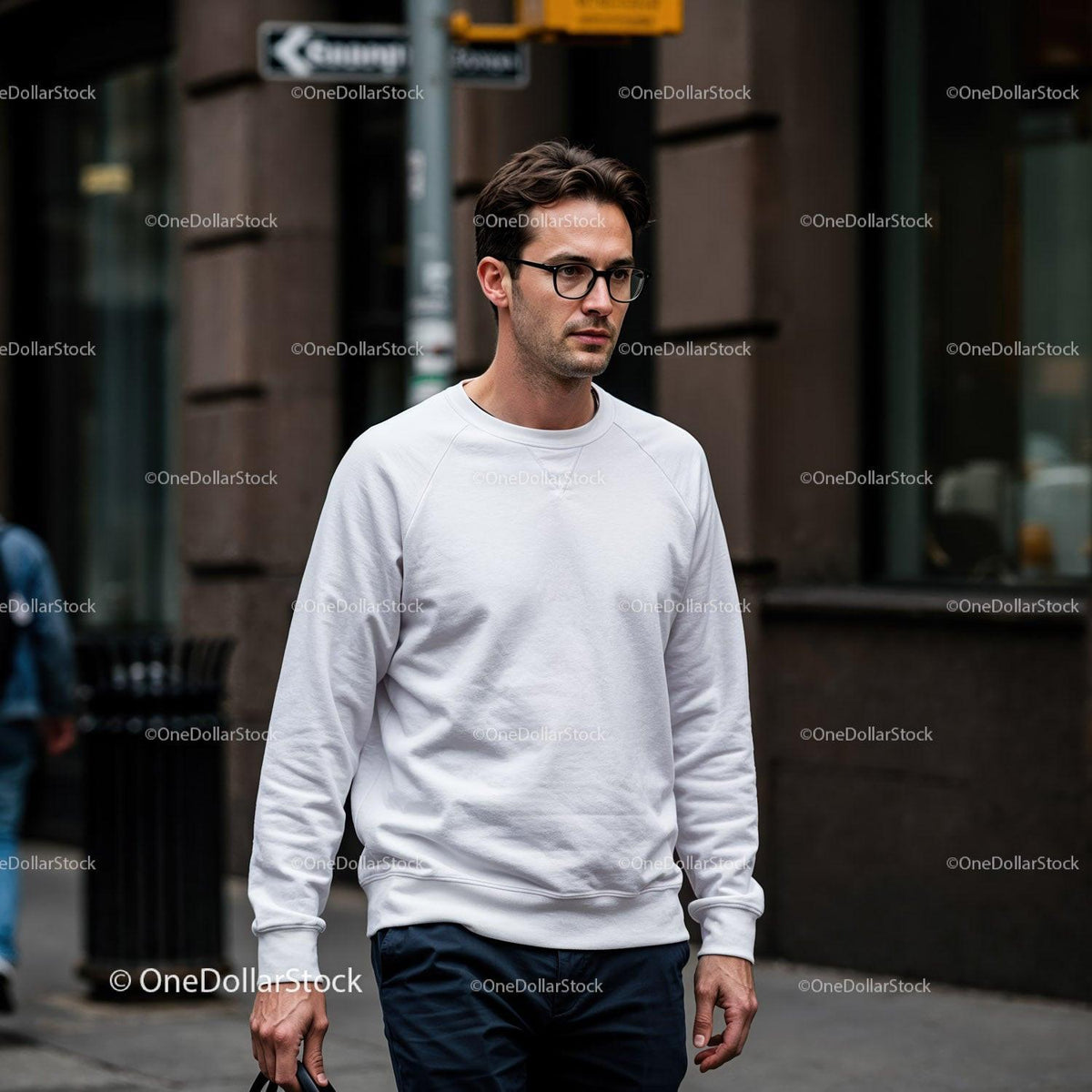 Young man walking on urban street wearing white sweatshirt JPG Mockup Image preview