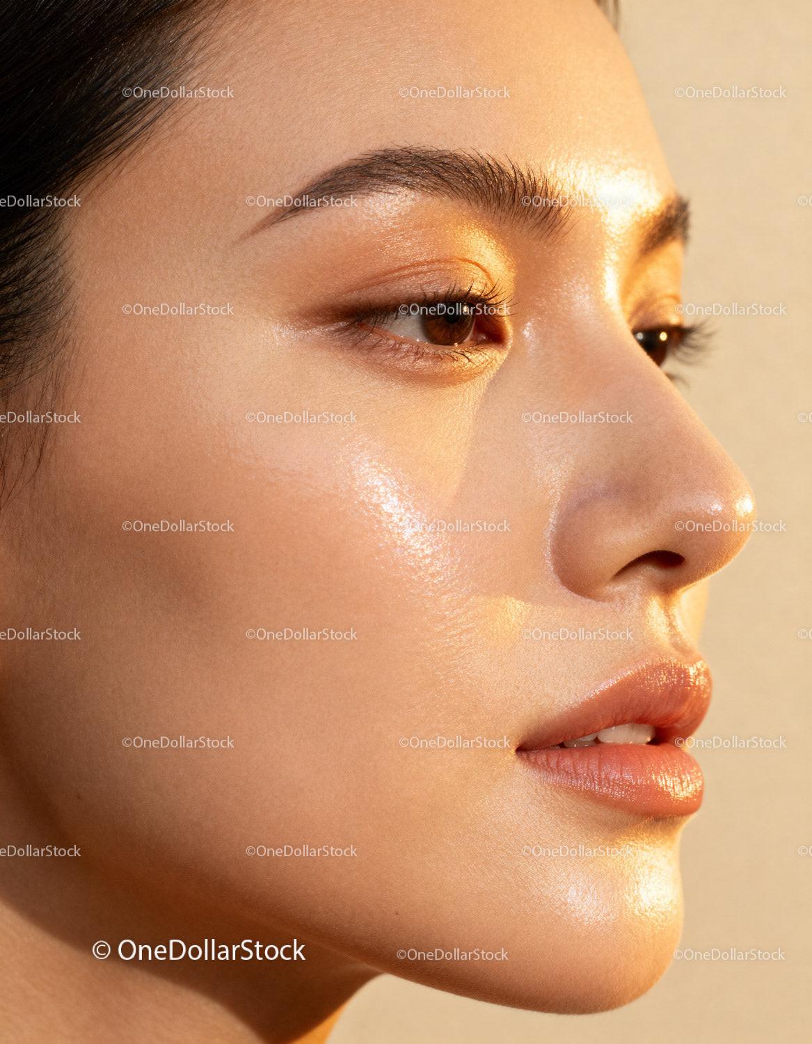 Close up of glowing skin on young woman's face