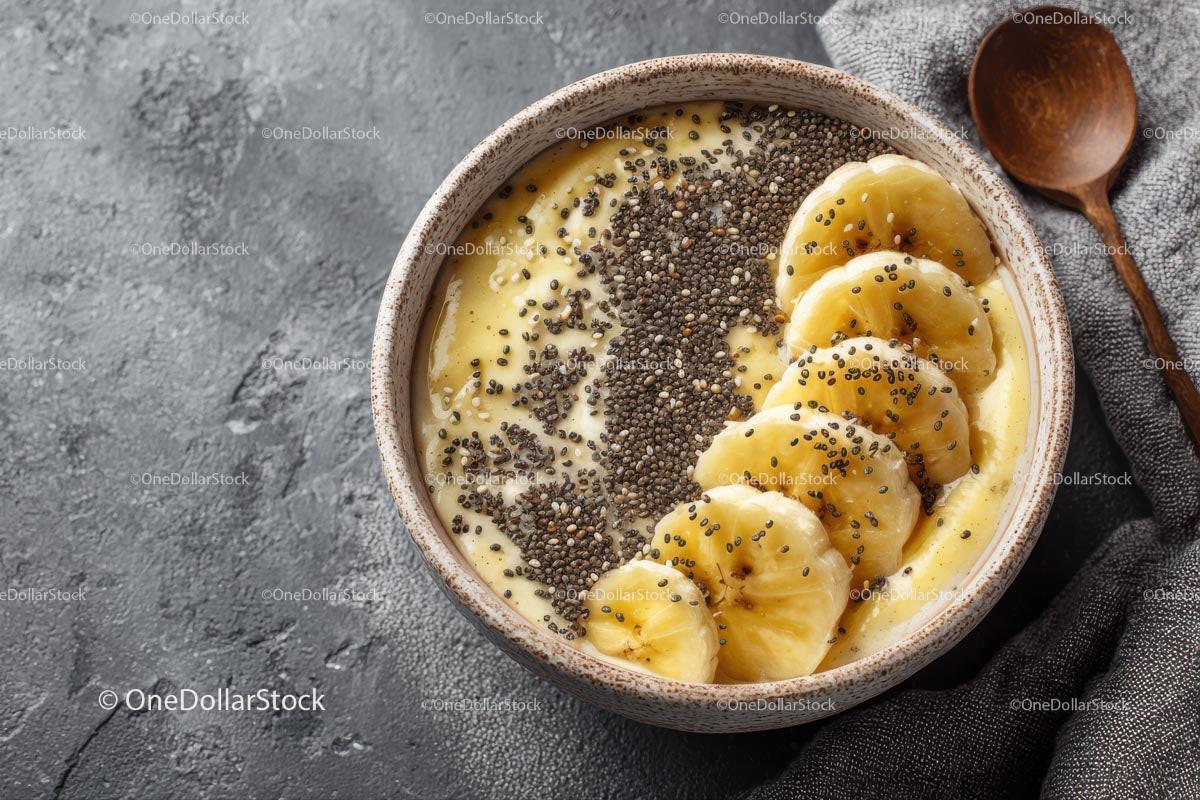 Delicious Tropical Smoothie Bowl with Banana and Chia Seeds Stock Photo Bundle preview 8