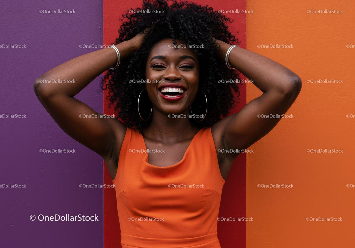 Vibrant Happy Woman with Curly Hair Standing Against Colorful Wall